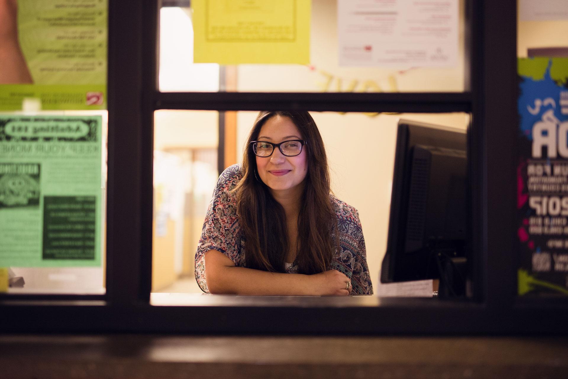 staff at a window ready to help